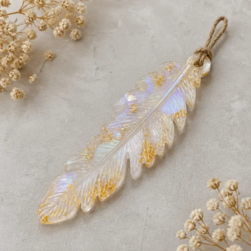 Decorative wall art featuring resin crystal feathers in elegant design