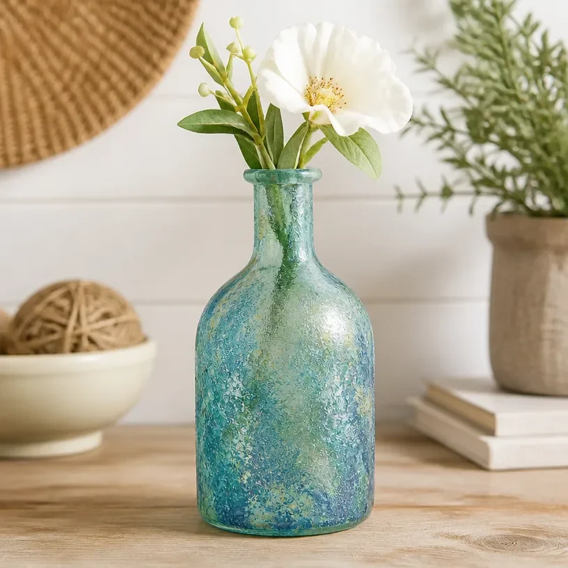 Beautiful sea glass vase designed for modern home decor with fresh flowers.